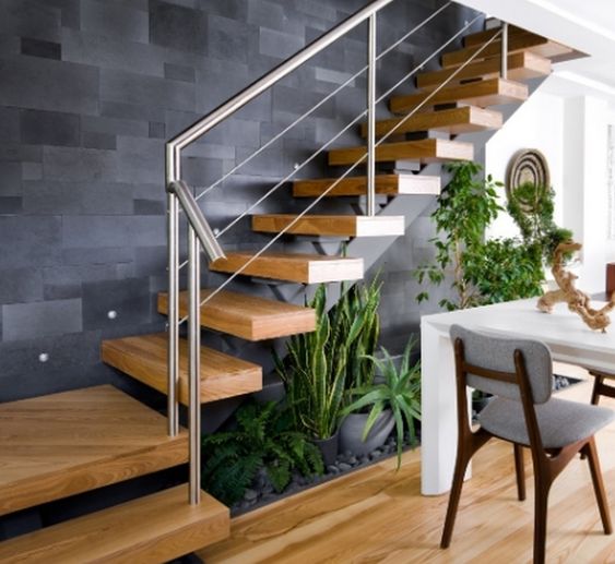 curva pierna en caso Escaleras para interiores: Diseños modernos de cemento, madera