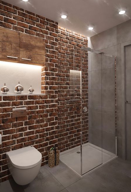baños con pared ladrillo a la vista