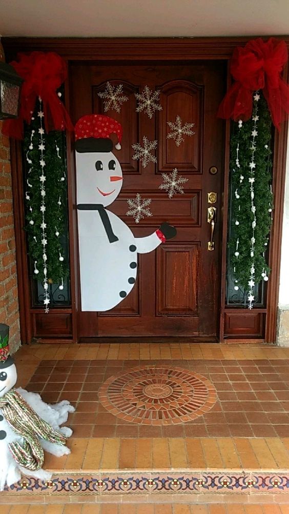 como decorar una puerta de navidad con papel